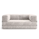 Frontale Studioansicht des modernen Schlafsofas EDI in beigem Breitcord, freigestellt vor einem reinweißen Hintergrund.