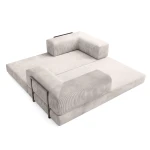 Schräge Draufsicht auf das großzügige Schlafsofa EDI im entfalteten Zustand, bezogen mit dem weichen Breitcord Poso.