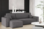Modernes Interieur mit der dunkelgrauen Wohnlandschaft KARL L im kuscheligen Poso 22 Cord-Gewebe auf einem Holzfußboden.