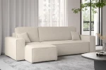 Moderne Raumgestaltung mit der hellen Bouclé-Wohnlandschaft KARL L als komfortabler Mittelpunkt neben großen Panoramafenstern.