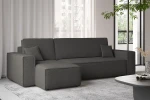 Kontrastreiches Wohnzimmerdesign mit der dunkelgrauen Wohnlandschaft KARL U im trendigen Bouclé-Stoff Abriamo.