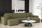 Stilvolle Einrichtung mit dem olivgrünen Lounge-Sofa KARL U aus dem gerippten Poso 44 Cordstoff als farblicher Akzent.