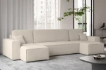 Moderne Raumgestaltung mit der hellen Bouclé-Wohnlandschaft KARL U als komfortabler Mittelpunkt neben großen Panoramafenstern.