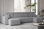 Graues U-Form Sofa KARL U aus elegantem Bouclé-Gewebe in einem zeitgenössischen Wohnzimmer mit stilvollem Couchtisch.