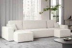 Luftiges Wohnzimmer mit dem cremefarbenen Ecksofa KARL U im eleganten Bouclé-Stoff Abriamo vor großen Fenstern.