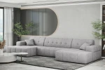 Elegantes Wohnzimmerkonzept mit dem hellgrauen U-Sofa Balia U im markant gesteppten Chenille-Bezug Perfect Harmony 80.