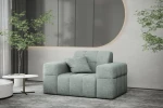 Zeitgemäßes Wohnzimmerdesign mit dem mintfarbenen Sessel Balia im gemütlichen Chenille Perfect Harmony 72 neben einer Zimmerpflanze.
