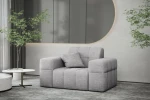 Elegantes Raumkonzept mit dem hellgrauen Sessel Balia aus dem weichen Chenille-Stoff Perfect Harmony 80 vor einer dekorativen Wandpaneele.