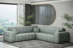 Zeitgemäße Wohnzimmergestaltung mit dem mintfarbenen Ecksofa Balia Corner im gemütlichen Chenille-Stoff Perfect Harmony 72 neben einer Zimmerpflanze.