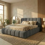Dunkelgraues Polsterbett Dallas Slim 160x200 cm aus trendigem Cordstoff Poso, das einen modernen Kontrast im hellen Interieur bildet.