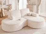 Stilvoll arrangiertes Ecksofa Sofia L in der Größe 210x157 cm, bezogen mit elegantem Riviera Velour und Abriamo Boucle, in einem modernen Wohnzimmer.