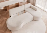 Detailansicht der bequemen Kissen und der Rückenlehne des 277x157 cm großen Sofas Sofia XL im luxuriösen Design aus Abriamo Boucle und Riviera Velour.
