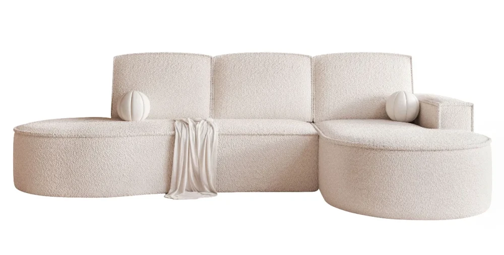 Ein modernes Ecksofa Sofia XL (277x157 cm) mit weichem Bezug aus Abriamo Boucle und Riviera Velour, freigestellt auf hellem Hintergrund.