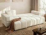 Das Ecksofa BUENO L (250x148 cm) im Bouclé-Design, hier vollständig ausgeklappt zur praktischen Nutzung als komfortables Schlafsofa.
