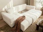 Das ausgeklappte Schlafsofa BUENO L (250x148 cm) aus Bouclé-Stoff mit geöffnetem, geräumigem Bettkasten für zusätzlichen Stauraum.