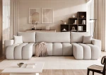 Frontalansicht der U-förmigen Design Wohnlandschaft OFI U (318x145 cm) mit weichem Bouclé-Bezug, stilvoll arrangiert in einem modernen Wohnzimmer.