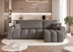 Frontalansicht des Design Ecksofas L-Form OFI L (248x145 cm) mit weichem Bouclé-Bezug, stilvoll arrangiert in einem modernen Wohnzimmer.