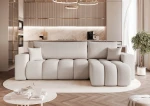 Frontalansicht des Design Ecksofas L-Form OFI L (248x145 cm) mit weichem Bouclé-Bezug, stilvoll arrangiert in einem modernen Wohnzimmer.
