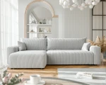 Frontalansicht des Design Ecksofas L-Form PIANO XL (278x145 cm) mit weichem Poso Cord Bezug, stilvoll arrangiert in einem modernen Wohnzimmer.