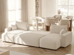 Die Design U-Form Wohnlandschaft PIANO U (318x145 cm) aus Bouclé, hier vollständig ausgeklappt zur praktischen Nutzung als großzügiges Schlafsofa.