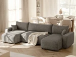 Schräge Ansicht der Design U-Form Wohnlandschaft PIANO U (318x145 cm) mit weichem Bouclé-Bezug, stilvoll arrangiert und integriert in eine moderne Wohnumgebung.
