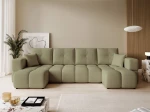 Frontalansicht der Design U-Form Wohnlandschaft BUENO U (318x145 cm) mit weichem Bouclé-Bezug, stilvoll arrangiert in einem modernen