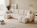 Schräge Ansicht der Design U-Form Wohnlandschaft BUENO U (318x145 cm) mit weichem Bouclé-Bezug, stilvoll arrangiert und integriert in eine moderne Wohnumgebung.