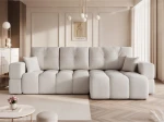 Frontalansicht des Design Ecksofas L-Form BUENO XL (278x145 cm) mit weichem Bouclé-Bezug, stilvoll arrangiert in einem modernen Wohnzimmer.