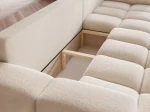 Das ausgeklappte Schlafsofa BUENO XL (278x145 cm) aus Bouclé-Stoff mit geöffnetem, integriertem Bettkasten für zusätzlichen Stauraum.