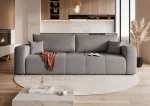 Frontalansicht des modernen Sofas PEDRO (244x93 cm) mit weichem Samtstoff Manila, stilvoll arrangiert in einem modernen Wohnzimmer.
