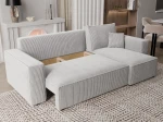 Das ausgeklappte Schlafsofa PARIS L (244x145 cm) aus Cord und Bouclé Stoff mit geöffnetem, integriertem Bettkasten für zusätzlichen Stauraum.