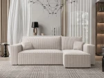 Frontalansicht des Ecksofas PARIS L (244x145 cm) mit einem eleganten Bezug aus Cord und Bouclé, stilvoll arrangiert in einem modernen Wohnzimmer.