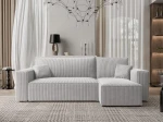 Frontalansicht des Ecksofas PARIS L (244x145 cm) mit einem eleganten Bezug aus Cord und Bouclé, stilvoll arrangiert in einem modernen Wohnzimmer.