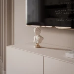 Nahaufnahme der grifflosen Fronten des Hänge-TV-Boards ANGEL 100, welche das praktische Push-To-Open-System und das elegante Design präsentiert.