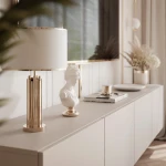 Nahaufnahme der grifflosen Fronten des Hänge-TV-Boards ANGEL 200, welche das praktische Push-To-Open-System und das elegante Design präsentiert.