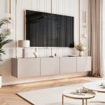 Schräge Ansicht des Hänge-TV-Boards ANGEL 200 mit LED, stilvoll arrangiert und harmonisch integriert in eine moderne Heimkino-Umgebung.