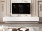 Frontalansicht des Hänge-TV-Boards ANGEL 300 mit stimmungsvoller LED-Beleuchtung, stilvoll arrangiert in einem modernen Wohnzimmer.