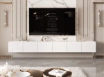 Frontalansicht des Hänge-TV-Boards ANGEL 300 mit stimmungsvoller LED-Beleuchtung, stilvoll arrangiert in einem modernen Wohnzimmer.
