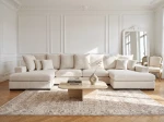 Frontalansicht der großen Wohnlandschaft SELLO in U-Form mit weichem Bezug aus Flow (Chenille), stilvoll arrangiert in einem geräumigen Wohnzimmer.