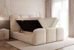 Das Polsterbett JUVELLE 200x200 cm mit hochgeklapptem Lattenrost, das den geräumigen, integrierten Bettkasten für eine praktische Aufbewahrung von Bettwäsche präsentiert.