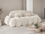 Schräge Seitenansicht des modernen Sofas STONE mit Bezug aus Vibe 03.