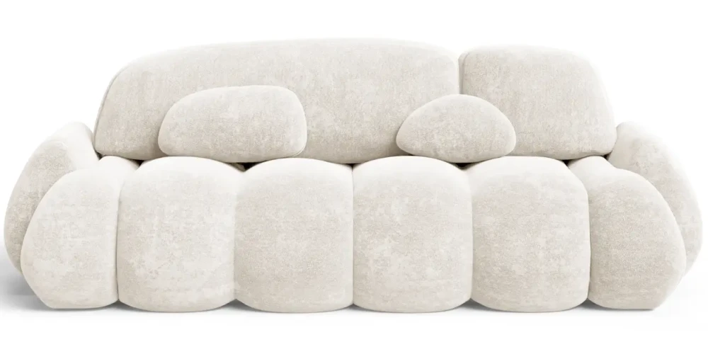 Frontalansicht des modernen Sofas STONE im Stoff Vibe 03, stilvoll arrangiert in einem gemütlichen Wohnzimmer