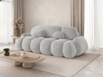 Schräge Seitenansicht des modernen Sofas STONE mit Bezug aus Vibe 86.
