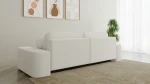 Rückansicht des modernen Sofas OVAL im Stoff Anthology 1, welche die sauber gepolsterte Rückseite präsentiert, ideal für eine freistehende Platzierung mitten im Raum.