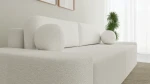 Nahaufnahme der Polsterung des Sofas OVAL, welche die feine Textur und den eleganten Farbton des Stoffes Anthology 1 im Detail präsentiert.