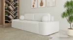 Schräge Ansicht des Sofas OVAL im Farbton Anthology 1, stilvoll arrangiert und harmonisch integriert in eine moderne Wohnumgebung.