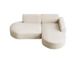 Draufsicht aus der Vogelperspektive auf das asymmetrische Ecksofa Prima Studio in Creme, welche die großzügige Sitzfläche und die abgerundete Formgebung freigestellt auf weißem Hintergrund zeigt.