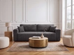 Das elegante Sofa Capri im dunkelgrauen Cordstoff Poso 22, das einen stilvollen und modernen Akzent im Raum setzt.